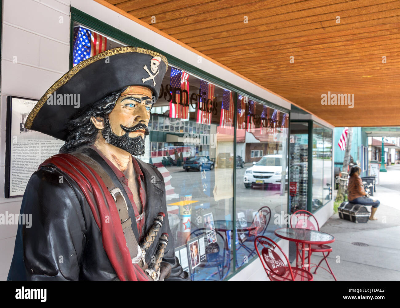 Wrangell, Alaska, USA - July 24, 2017: Pirate life size mannequin outside the Stikine Drug souvenirs store at the Front street. Stock Photo