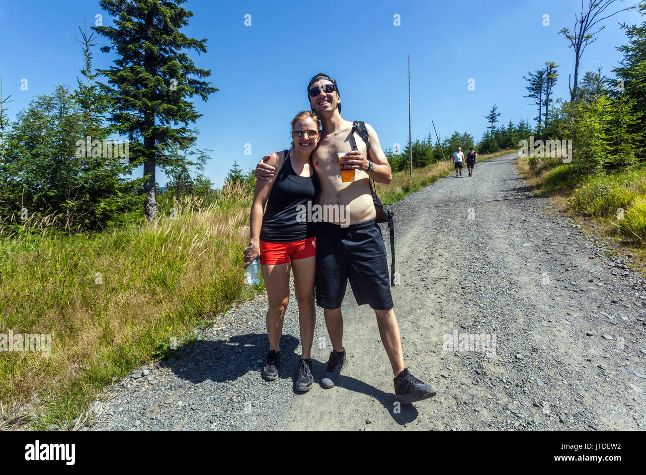 Sumava National Park, Czech Republic, a couple on a mountain road with beer, Czech Republic Stock Photo