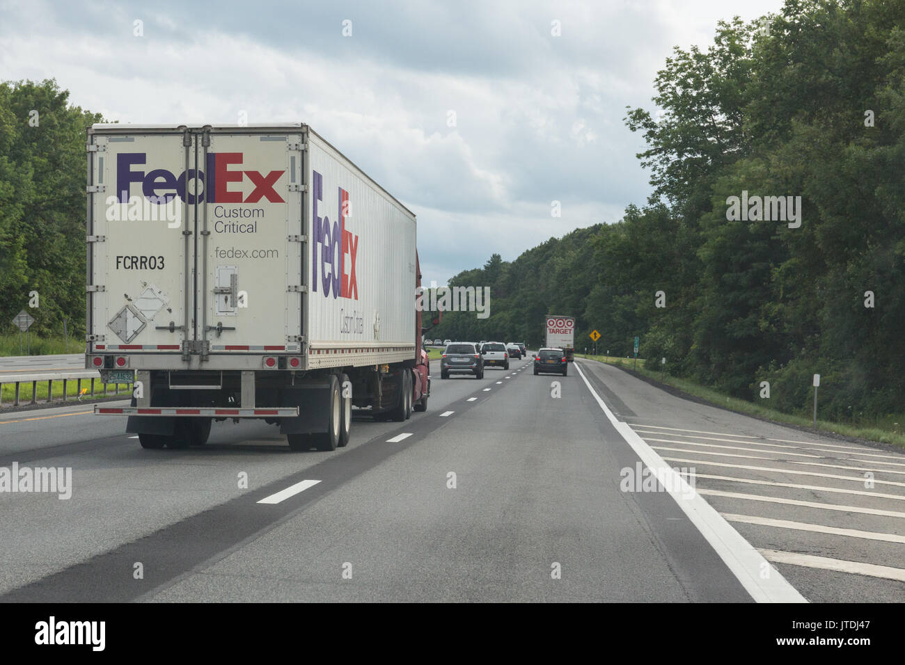 FedEx delivery lorry on a busy motorway Stock Photo