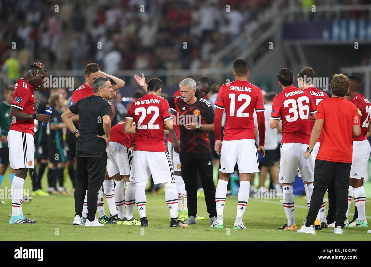 Manchester United manager Jose Mourinho speaks to his players during a water break in the first half during the UEFA Super Cup match at the Philip II Arena, Skopje, Macedonia. Stock Photo