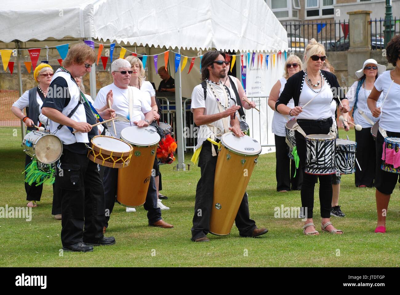 The Dende Nation samba drum troupe perform at the annual St. Leonards Festival at St.Leonards-on-Sea in East Sussex, England on July 13, 2013. Stock Photo