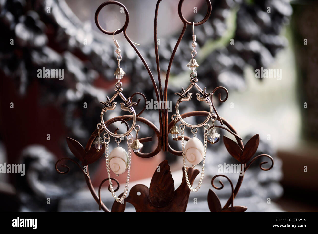 Hanging earrings hires stock photography and images Alamy