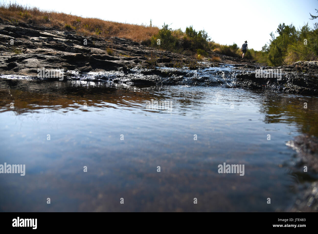 Walking away from Mac Mac Pools in South Africa Stock Photo