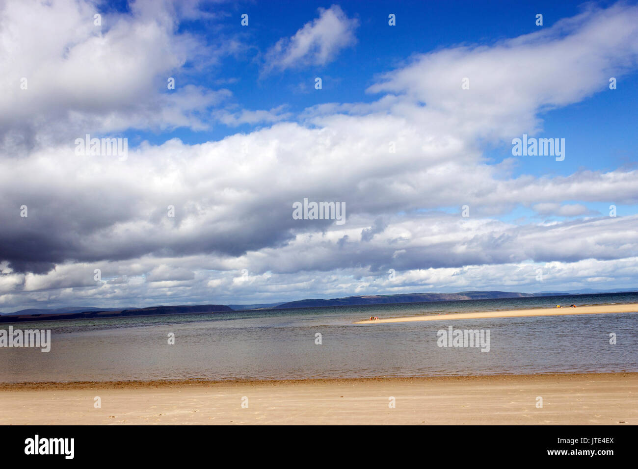 Scotland, Highlands, Nairn, Moray Firth, Dramatic Skyline, Beautiful Beach, Golden Sands, Blue Skies, White Clouds, Hilltop Background, Shoreline Stock Photo