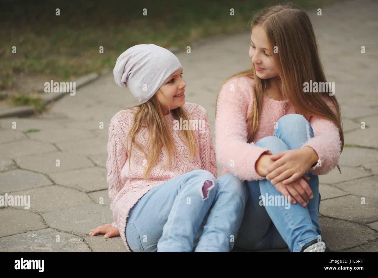 photo of two beautiful girls on the street Stock Photo - Alamy