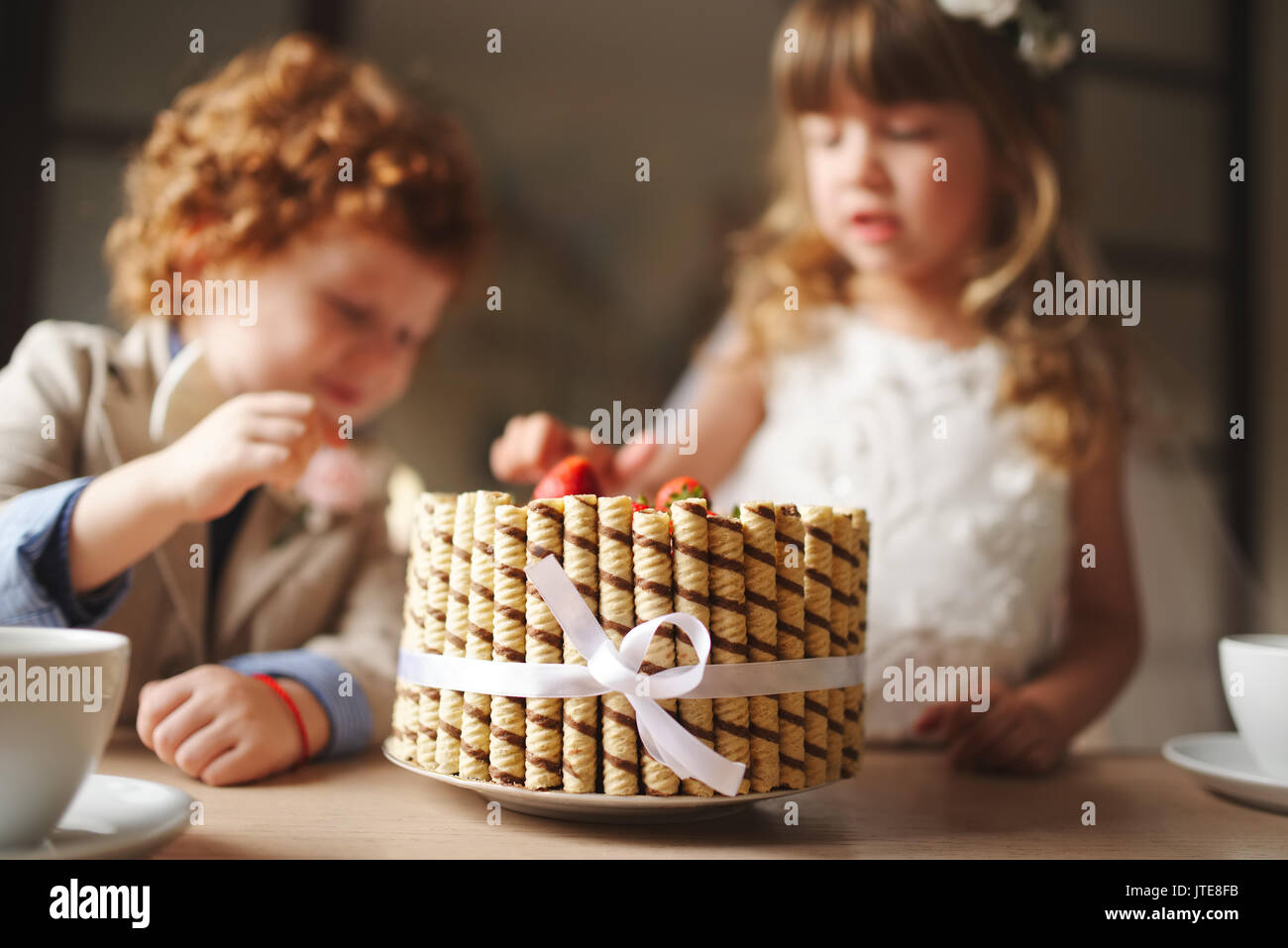 Boy girl playing tea party hi-res stock photography and images - Alamy