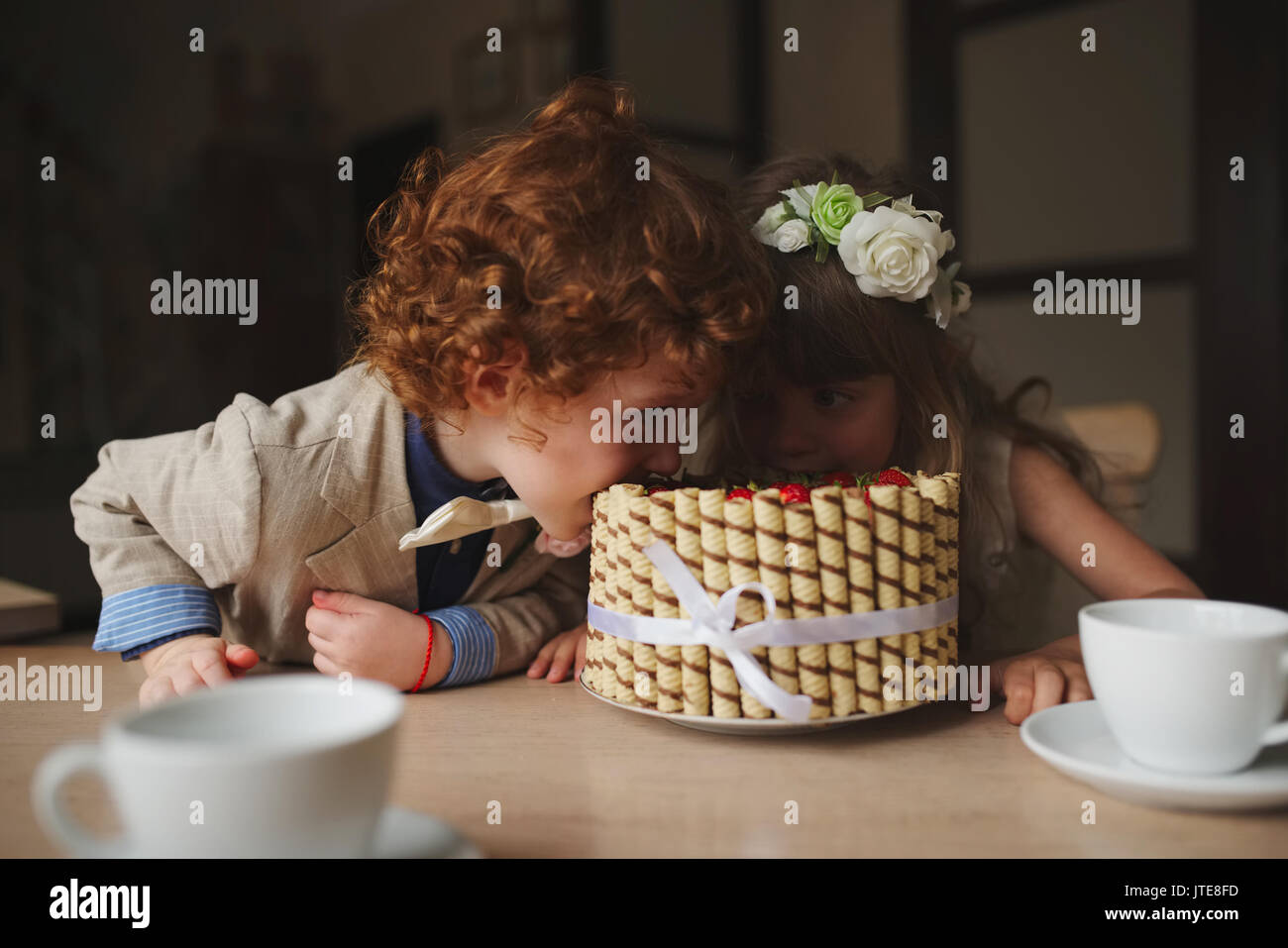 Boy girl playing tea party hi-res stock photography and images - Alamy