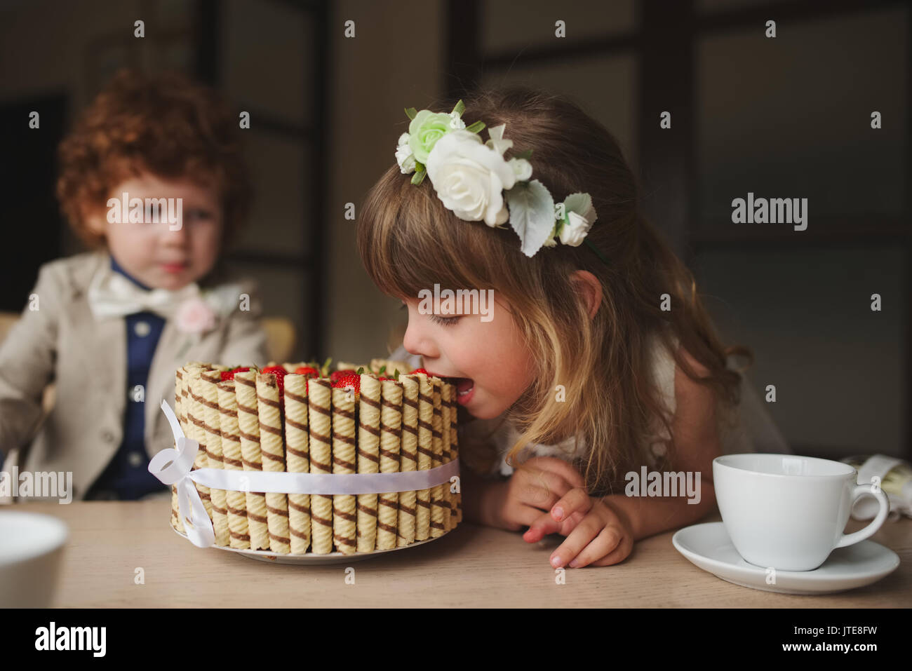 Boy girl playing tea party hi-res stock photography and images - Alamy