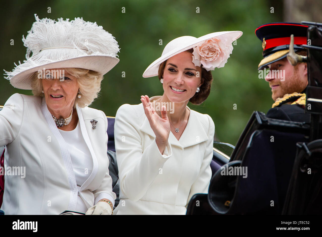 Duchess of Cambridge wearing an Alexander McQueen cream coat dress, Duchess of Cornwall & Prince Harry in his Blues and Royals uniform. 11/6/2016 Stock Photo