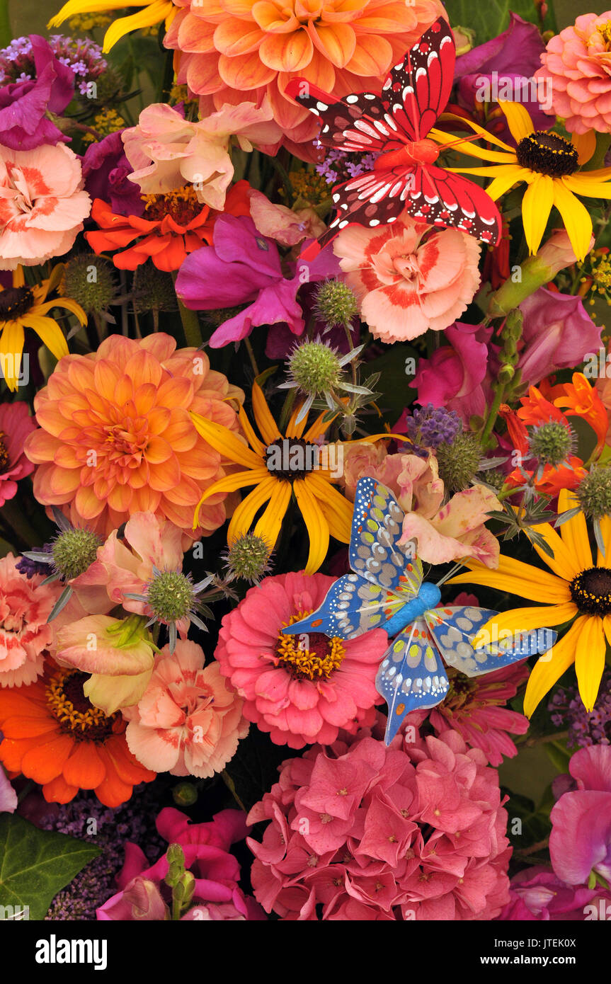 A Very Brightly Coloured Beautiful Display Of Various Flowers And a-very-brightly-coloured-beautiful-display-of-various-flowers-and