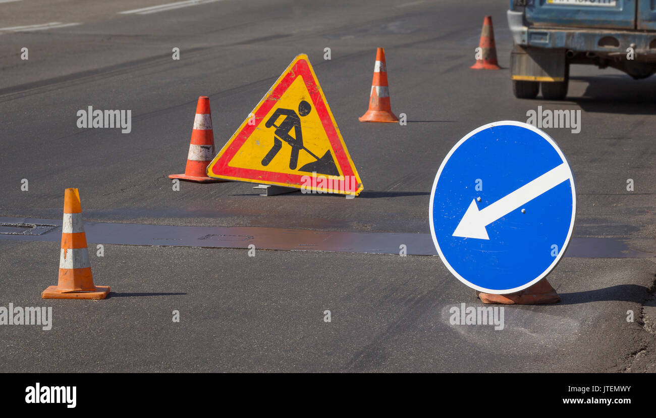 Road repairs and signs meaning a detour Stock Photo