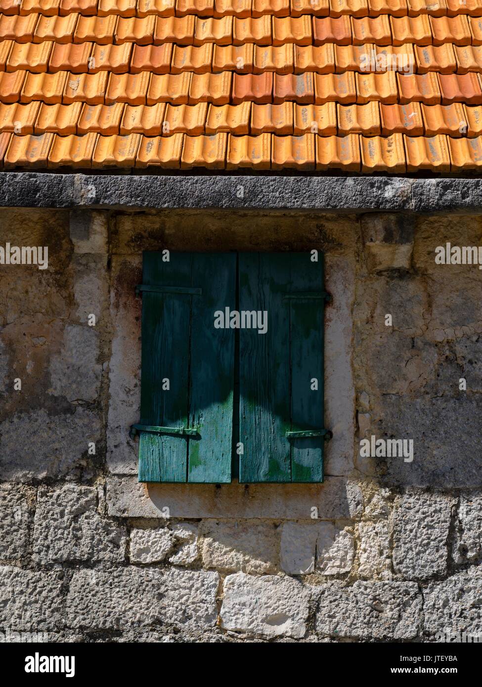 Mediterranean architecture detail Green window Nerezisca on Brac island in Croatia Stock Photo