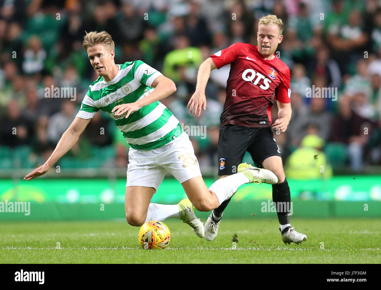 Celtic's Kristoffer Ajer  Rory McKenzie and Kilmarnock's battle for the ball during the Betfred Cup, Second Round match at Celtic Park, Glasgow. PRESS ASSOCIATION Photo. Picture date: Tuesday August 8, 2017. See PA story SOCCER Celtic. Photo credit should read: Jane Barlow/PA Wire. Stock Photo