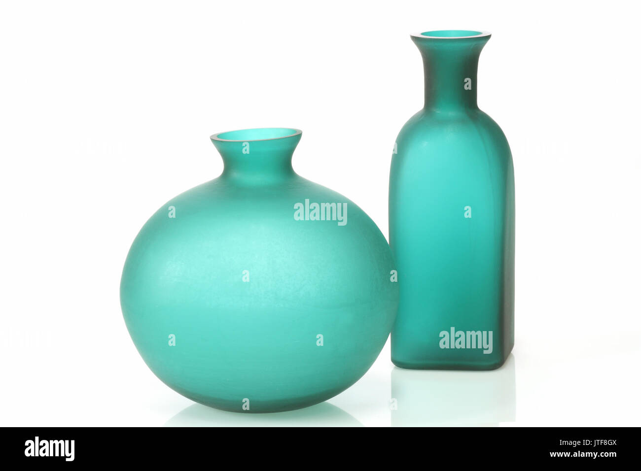 Modern green vases on bright background Stock Photo Alamy