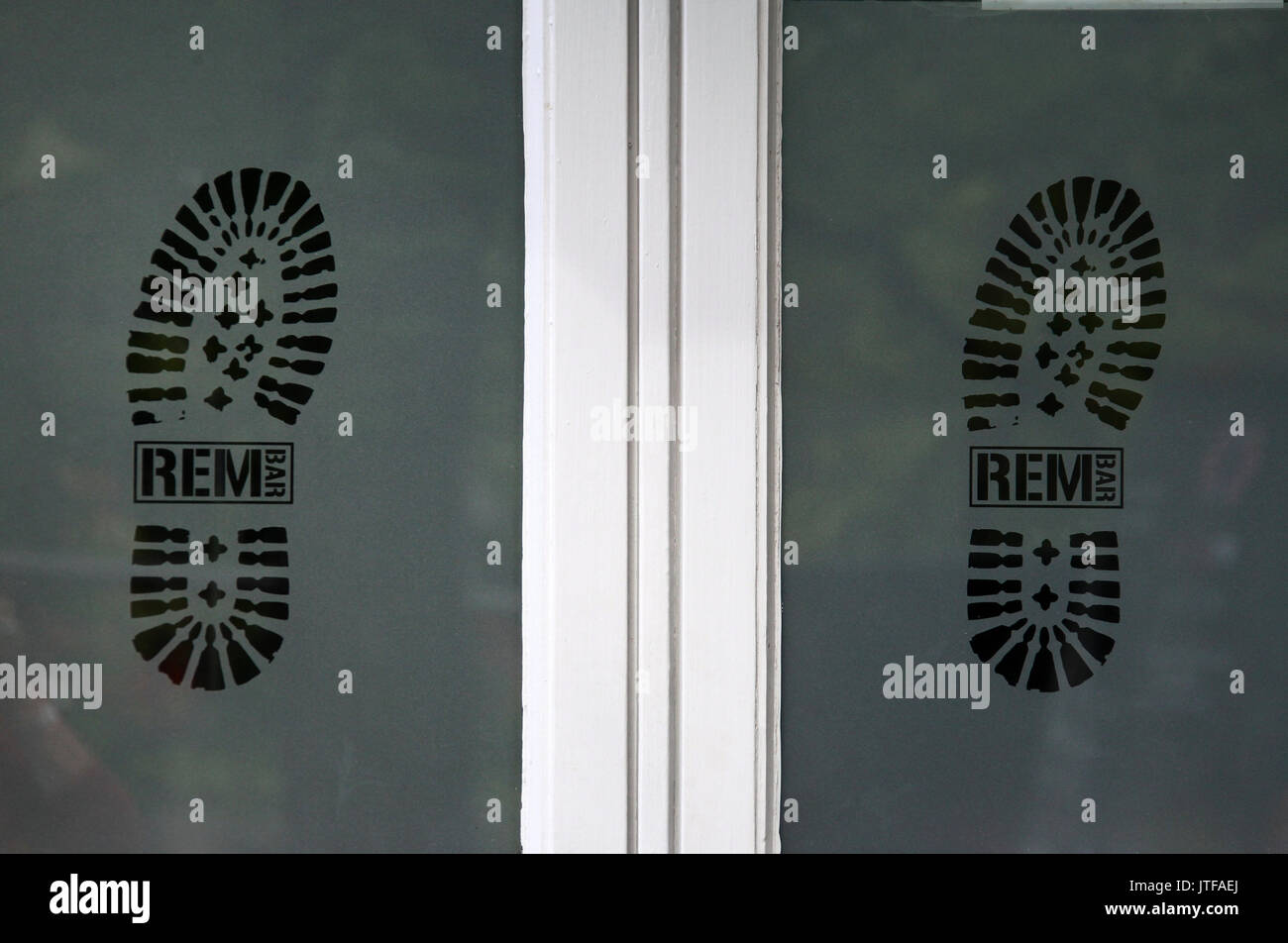 Window of the REM bar on Canal Street in Manchesters Gay Village Stock Photo