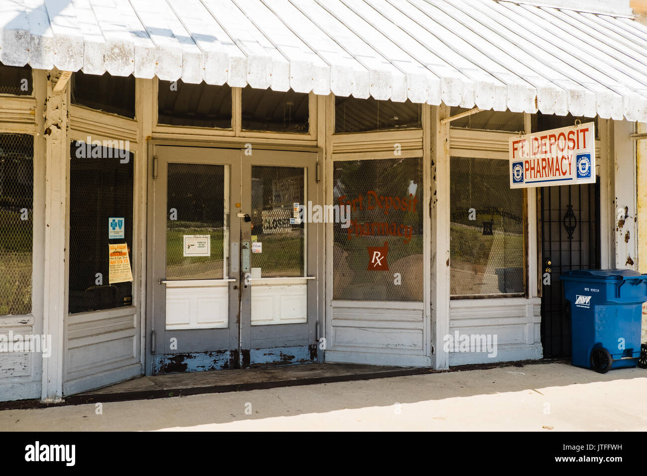 Closed pharmacy store front in the poor small rural town of Ft. Deposit Alabama, USA. Stock Photo