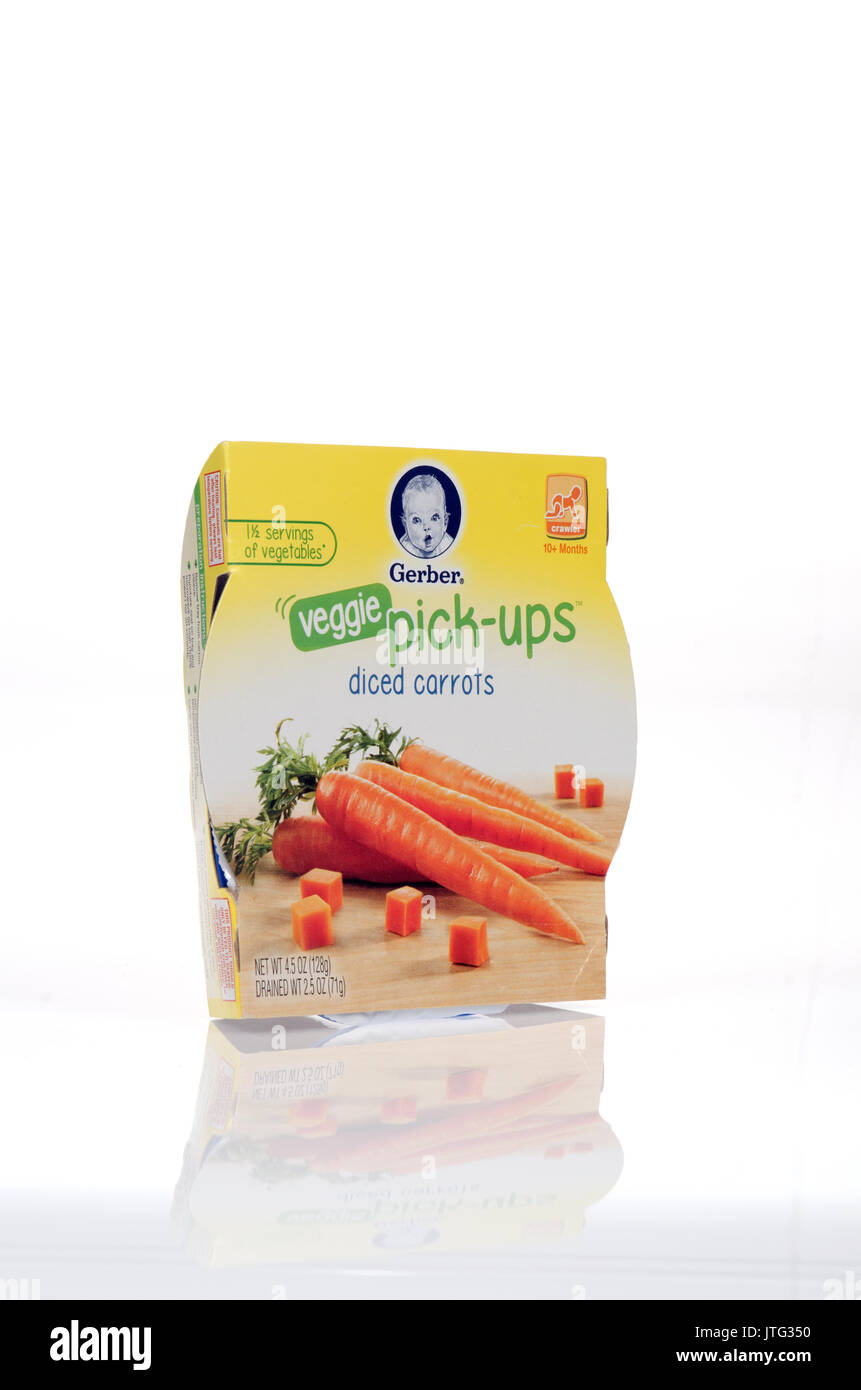 Package of Gerber veggie pick-ups diced carrots baby food on white background, cut-out. USA Stock Photo