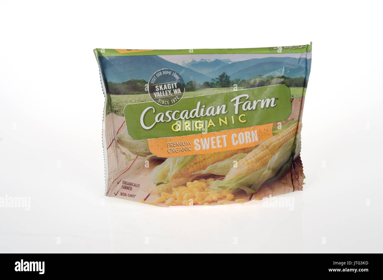Unopened bag of Frozen Organic Sweet Corn by Cascadian Farms on white background. USA Stock Photo