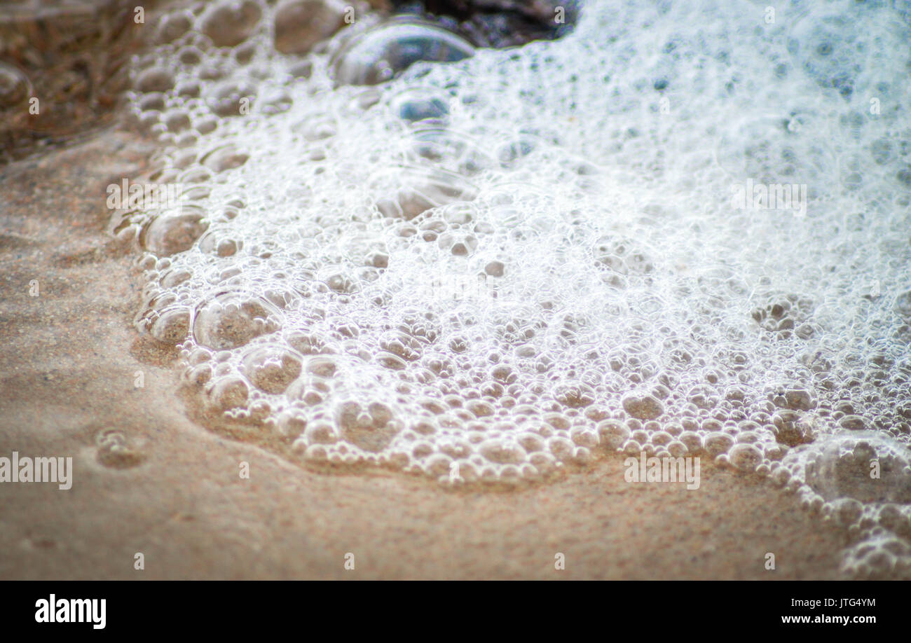 bubbles and foam on waters surface Stock Photo