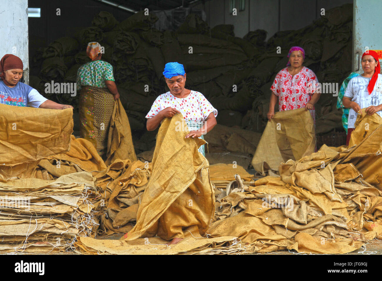 Sack folders in Tobacco Factory in Indonesia Stock Photo