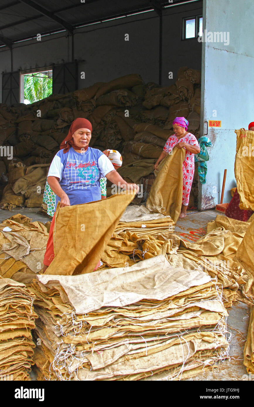 Sack folders in Tobacco Factory in Indonesia Stock Photo