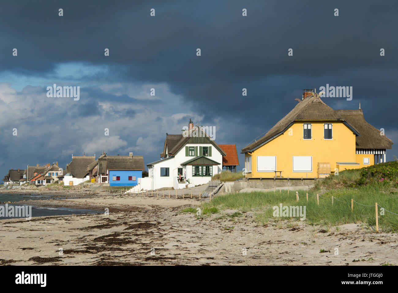 Holiday cottages beside the Graswarder nature conservation reserve on the Baltic coast at Heiligenhafen, Holstein, Germany Stock Photo