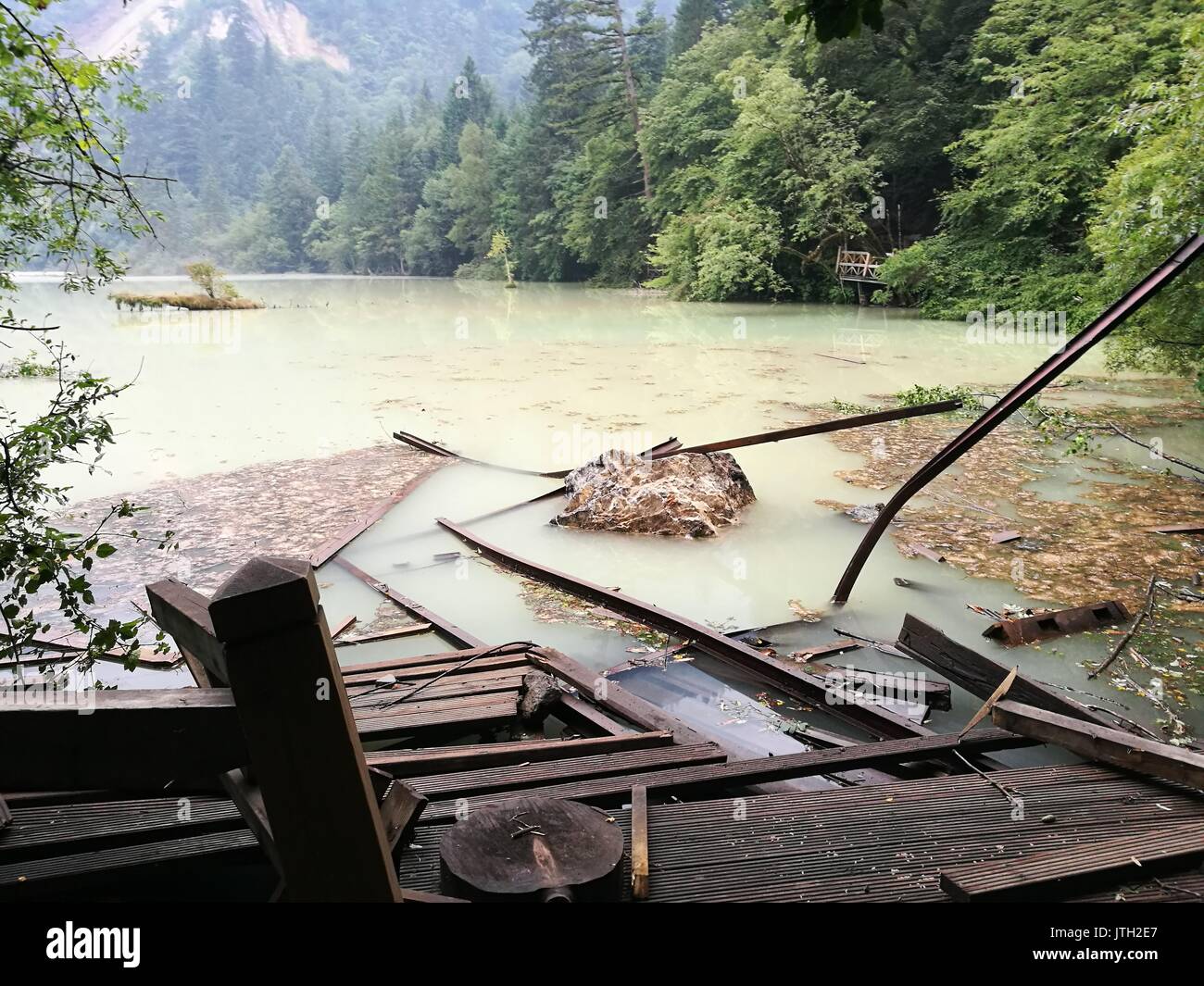 Jiuzhaigou. 9th Aug, 2017. Photo taken on Aug. 9, 2017 shows the scenic spot of Wuhua Lake in Jiuzhaigou County, southwest China's Sichuan Province. After a 7.0-magnitude earthquake jolted Jiuzhaigou County, staff members of the scenic spot started searching for the missing, paying close attention to the quake. Credit: Sang Ji/Xinhua/Alamy Live News Stock Photo