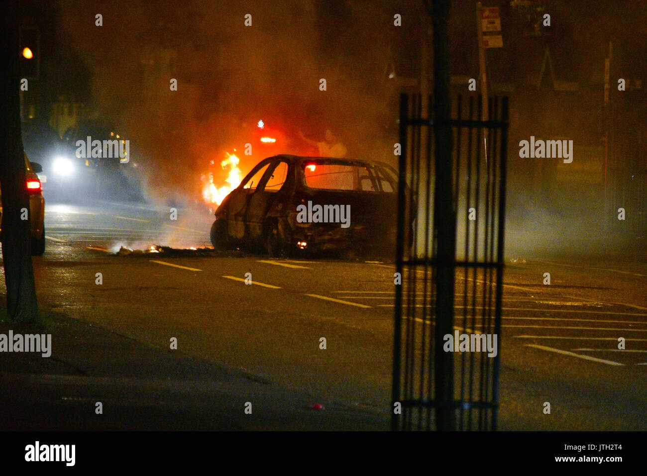 Belfast, Northern Ireland. 09th Aug, 2017. A Car burns in the middle of the road in the New Lodge area of Belfast. Belfast: UK: 09 AUG Credit: Mark Winter/Alamy Live News Stock Photo