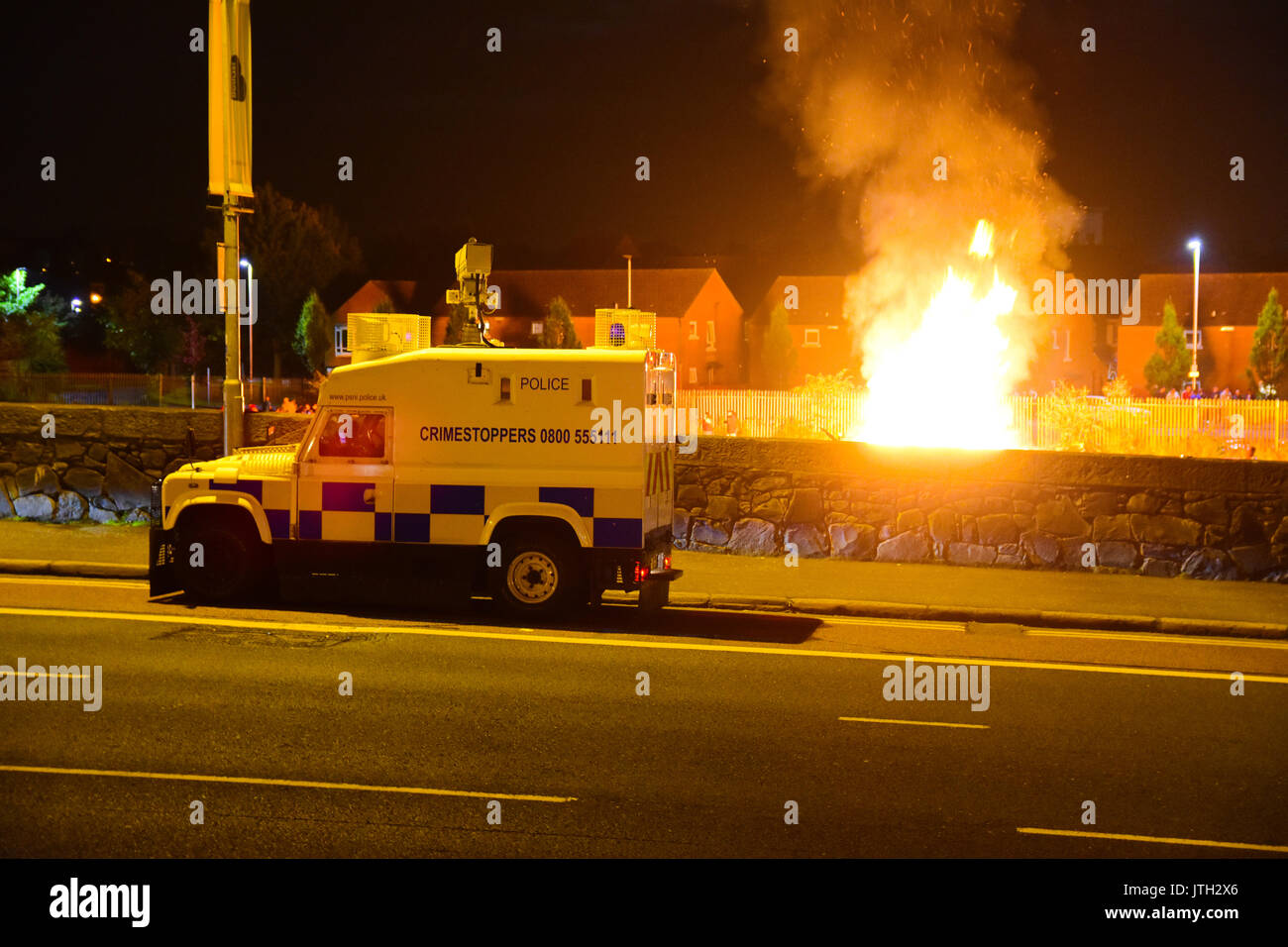 Belfast, Northern Ireland. 09th Aug, 2017. PSNI TSG Units observe an Anti-Internment Bonfire at the Markets area of Belfast. the event passed off peacefully after a day or rioting the previous day when the same bonfire had been removed. Belfast: UK: 09 AUG Credit: Mark Winter/Alamy Live News Stock Photo