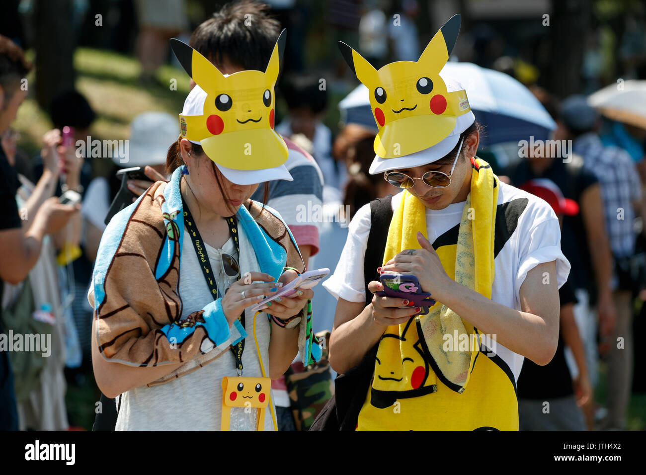 Yokohama Japan 9th August 17 People Catch Pokemon Characters On Their Smartphones On One Of The Hottest Days Of The Summer At Pokemon Go Park In Yokohama Minatomirai On August 9 17