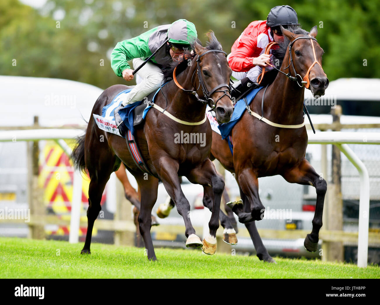 Brighton, UK. 9th Aug, 2017. Haveoneonyerself ridden by John Egan (green colours) wins the The Visit marathonbet.co.uk Nursery Handicap Stakes in the first race at the Marstons Race Day in the Maronthonbet Festival of Racing at Brighton Racecourse Credit: Simon Dack/Alamy Live News Stock Photo