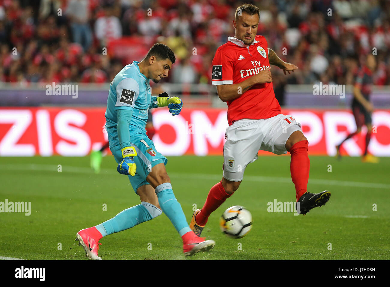 Lisbon, Portugal. 09th Aug, 2017. Braga«s goalkeeper Matheus Magalhaes from Brazil (L) and Benfica«s forward Haris Seferovic from Switzerland (R) during the Premier League 2017/18 match between SL Benfica v SC Braga, at Luz Stadium in Lisbon on August 9, 2017. Credit: Bruno Barros/Alamy Live News Stock Photo
