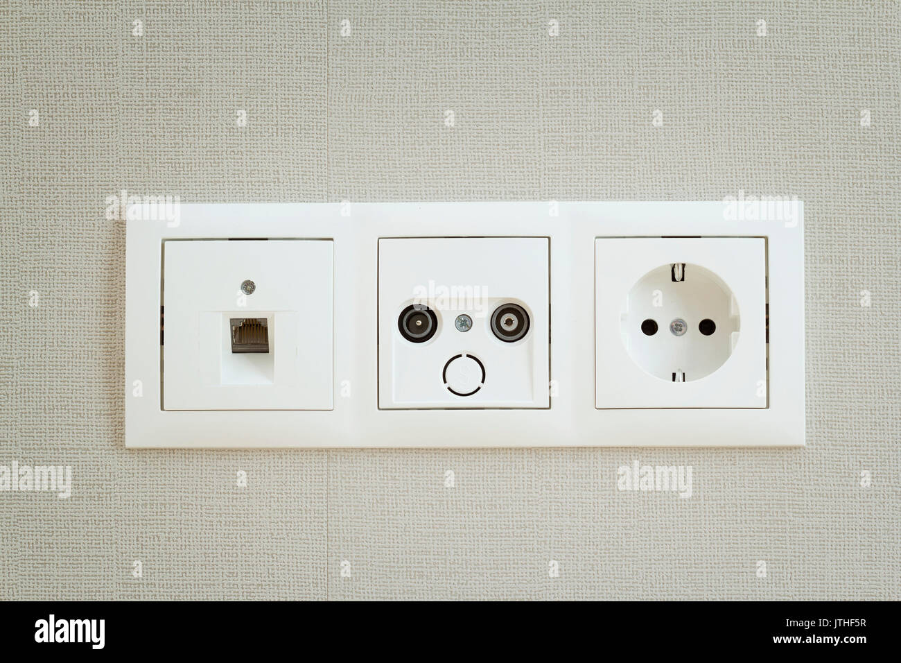 Different types of sockets on the wall Stock Photo