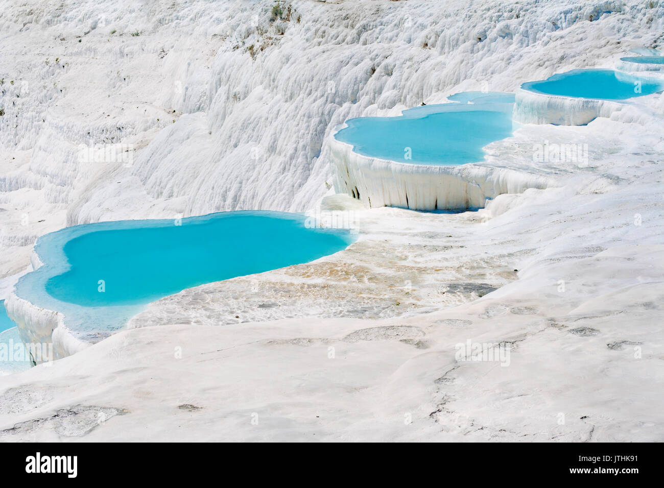 Natural travertine pools and terraces, Pamukkale, Turkey Stock Photo