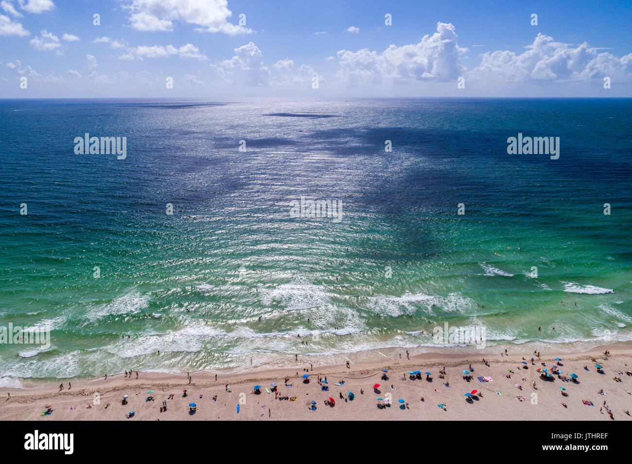 Miami Beach Florida,aerial overhead from above view,above,from above view,Atlantic Ocean,sand,sunbathers,FL17080604d Stock Photo