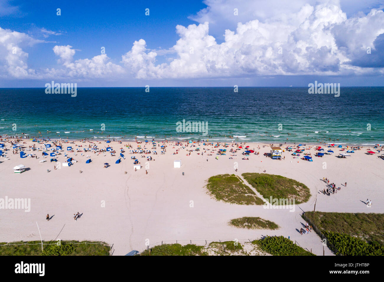 Miami Beach Florida,aerial overhead from above view,above,from above view,Atlantic Ocean,sand,sunbathers,FL17080612d Stock Photo