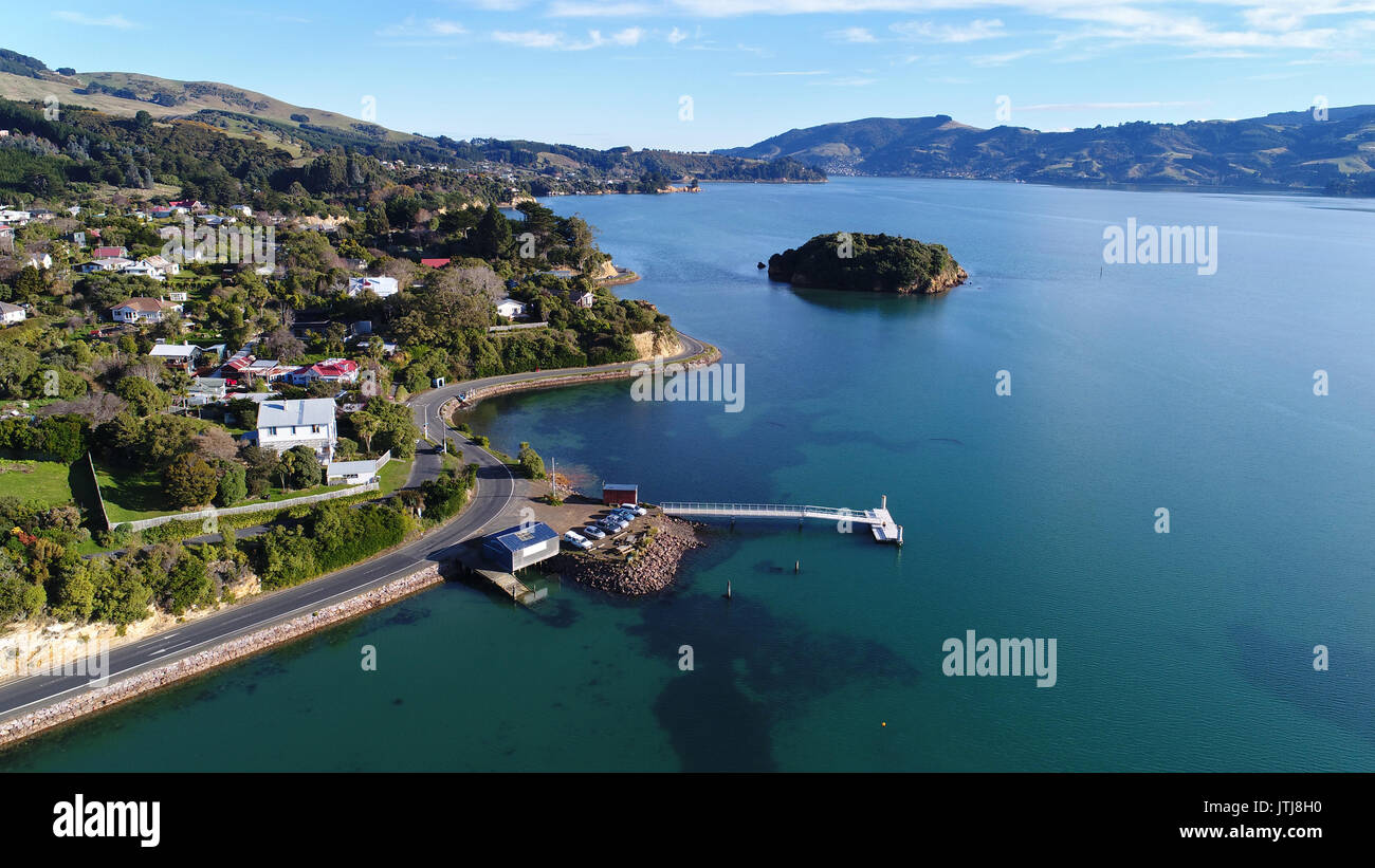 Portobello, Otago Peninsula, and Otago Harbour, Dunedin, South Island, New Zealand - drone aerial Stock Photo