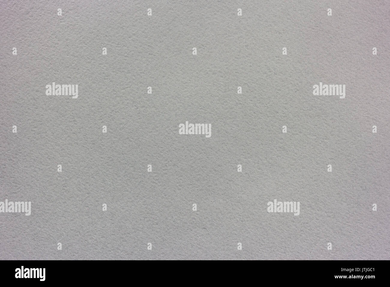 grey pastel paper textured background with detailed texture of paper fiber Stock Photo