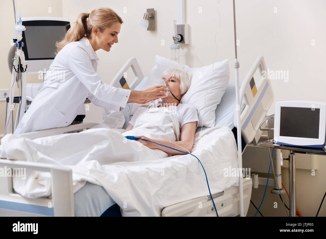 Trained qualified doctor employing medical devices Stock Photo Alamy