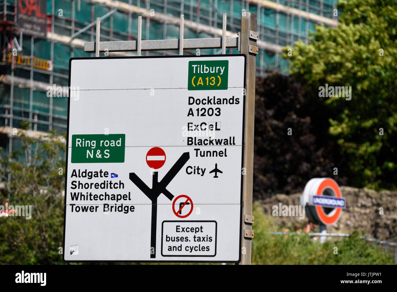Road directions sign in Tower Hill London with A13, City Airport