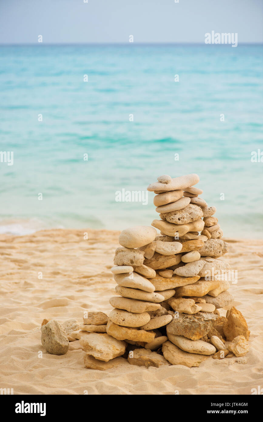 Balance stone on sea coast. Zen rocks on the beach. Feng Shui balance ...