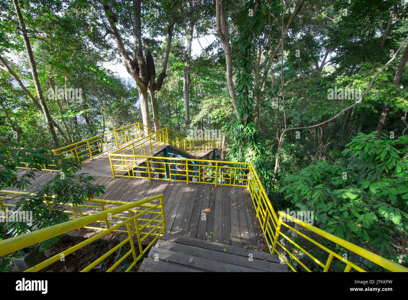 Walkway through rain forest at Kilometer Zero Pulau Weh, the northernmost point of Indonesia Stock Photo