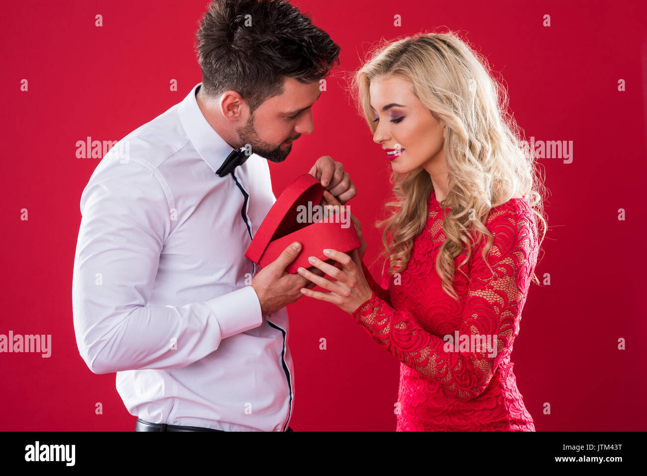 Curious couple looking in the box Stock Photo