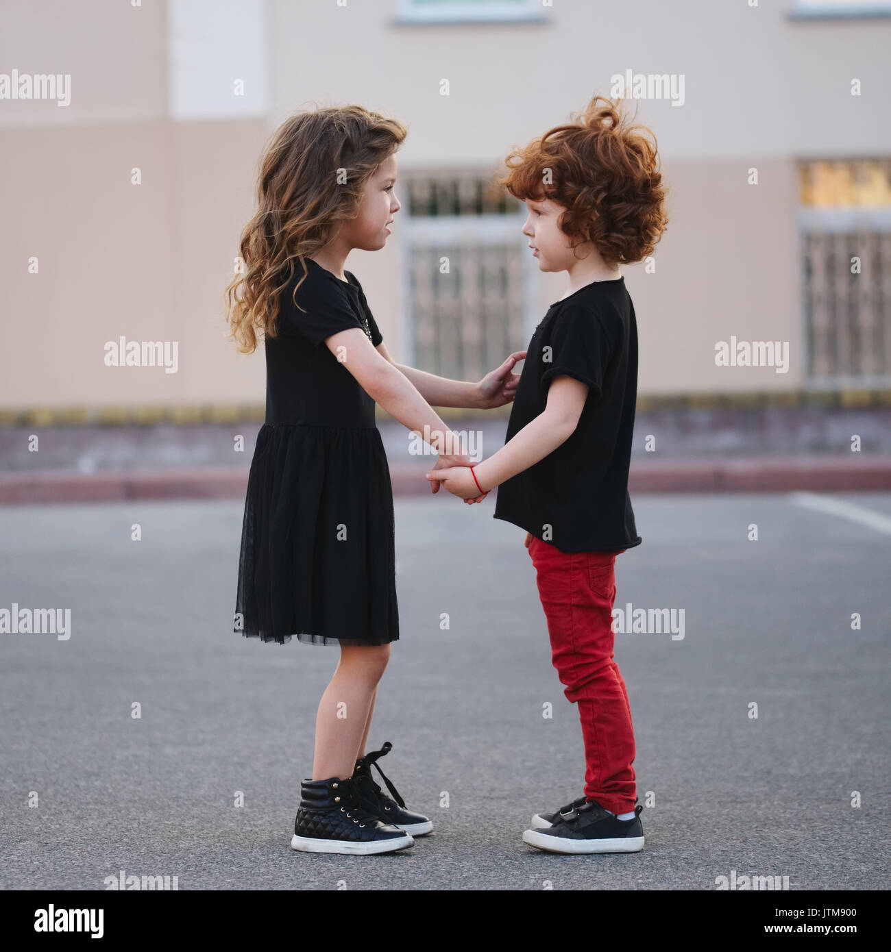 cute little girl edifies boy Stock Photo - Alamy