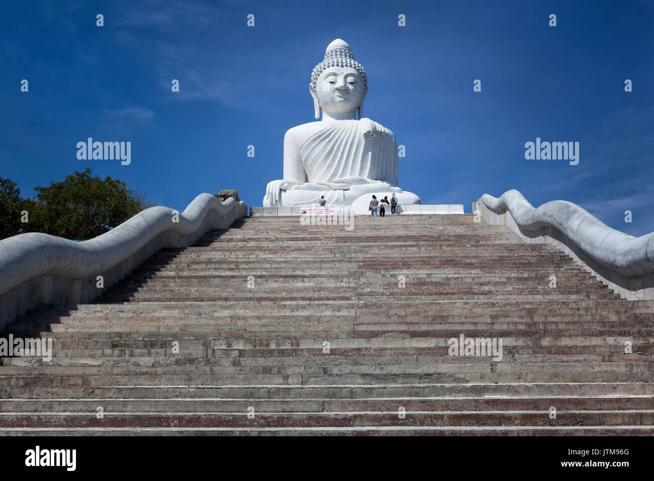 Phuket Big Buddha is a massive white marble statue on the peak of mount ...