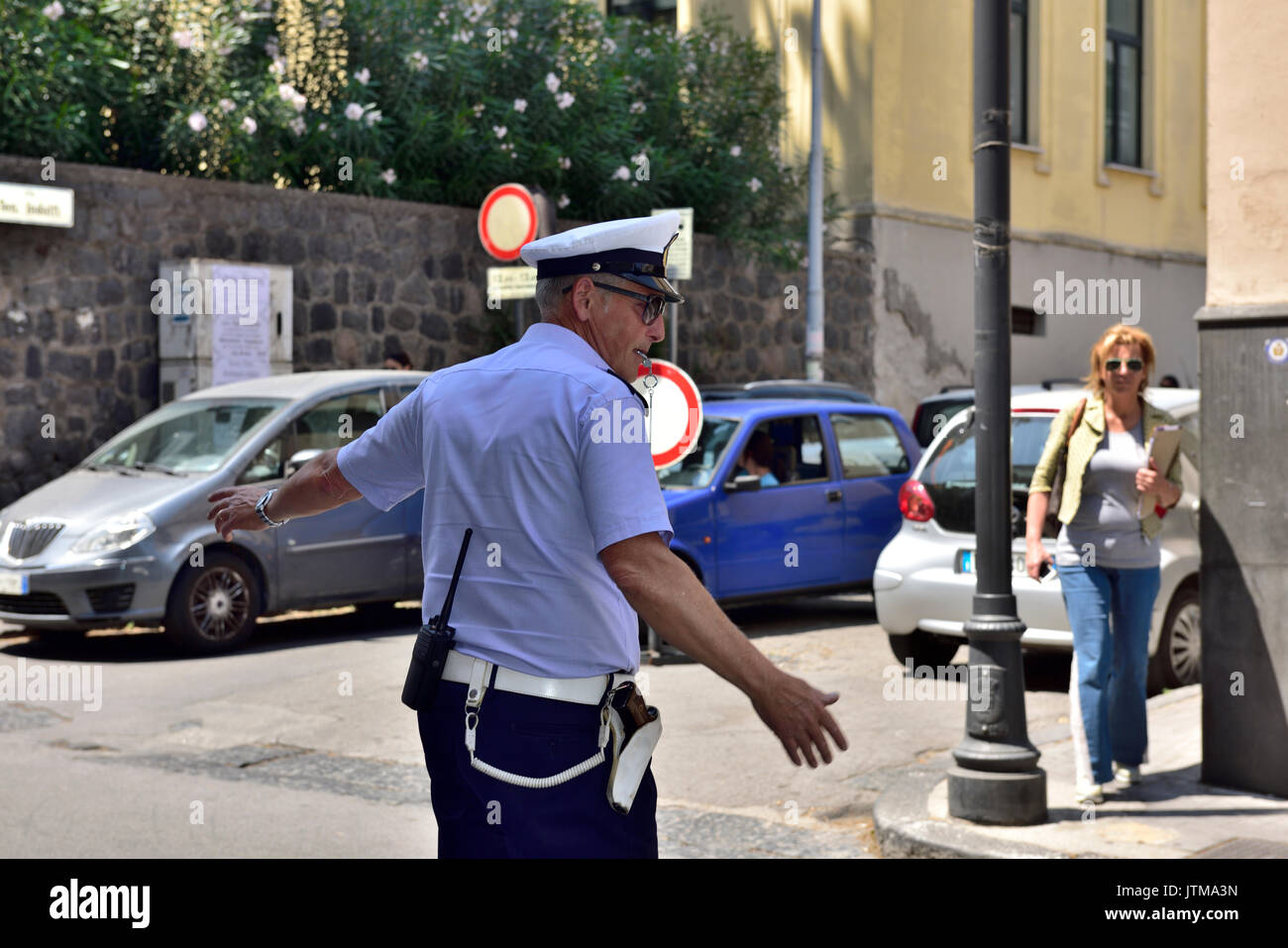 Italian policeman standing directing traffic Stock Photo