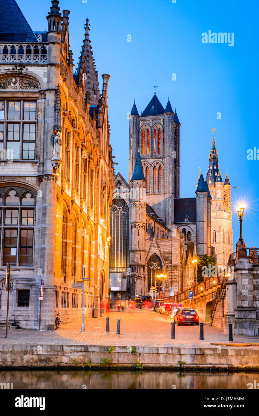 Gent, Belgium with Graslei district Saint Nicholas Church and Belfort tower at twilight illuminated moment in Flanders. Stock Photo