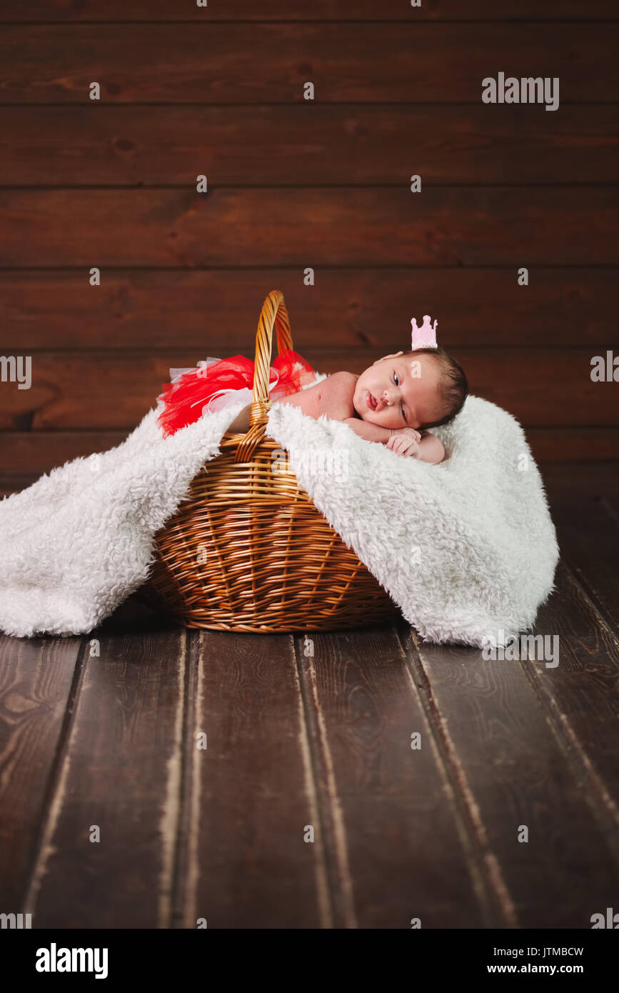 cute newborn baby in the basket Stock Photo Alamy