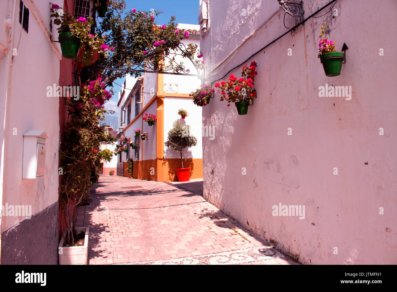 Street. Beautiful Spanish house. Flowers and trees Stock Photo - Alamy