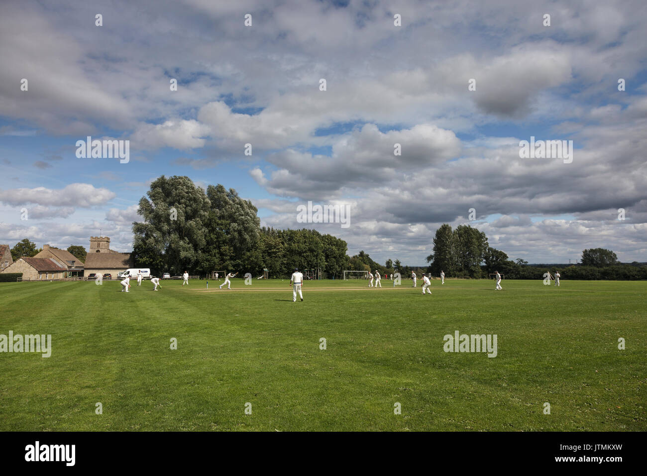 Village cricket match in cotswolds Stock Photo